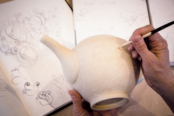 1 Design elements are combined from a variety of sources to create a unique pattern on each piece.