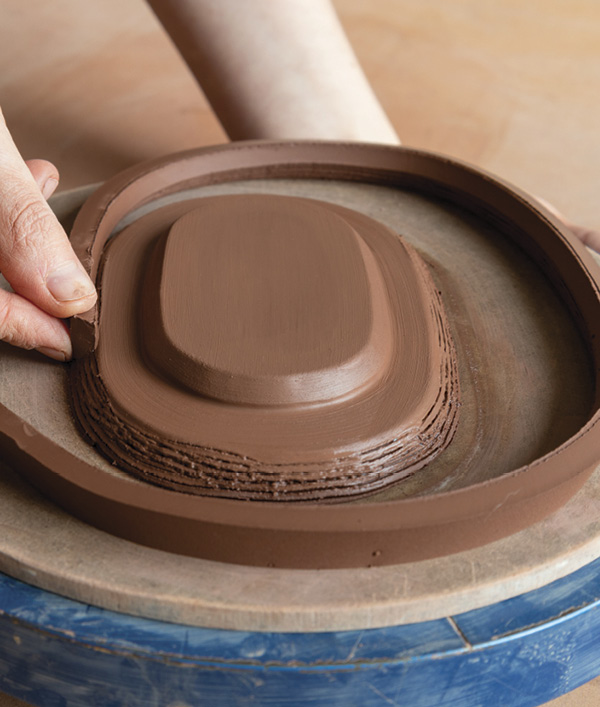 4 Bevel the edge of a ½-inch-wide (12.7-mm) strip, then slip, score, and attach it to the beveled outer edge.